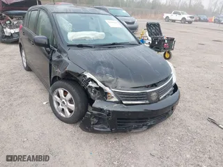 2009 Nissan Versa 1.8 S with VIN 3N1BC13E99L423269, listed as a IAAI auction lot 41490644 with 124,241 mi miles. Bid and sale history available at carsss.com. Image 6.