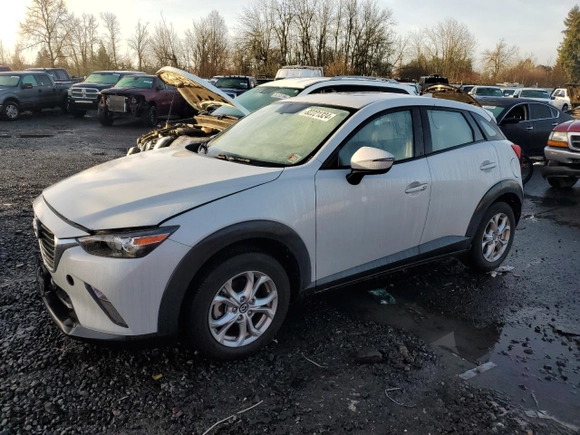 2016 Mazda CX-3 Touring with VIN JM1DKBC7XG0110631, listed as a Copart auction lot 82221324 with 20,922 mi miles and Salvage Title. Bid and sale history available at carsss.com. Image 1.