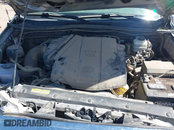 2015 Toyota Tacoma with VIN 3TMLU4EN6FM188736, listed as a IAAI auction lot 42605859 with 210,717 mi miles and . Bid and sale history available at DreamBid. Image 10.