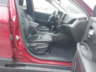 2015 Jeep Cherokee Trailhawk with VIN 1C4PJMBSXFW667469, listed as a IAAI auction lot 42438006 with 127,136 mi miles and . Bid and sale history available at DreamBid. Image 5.