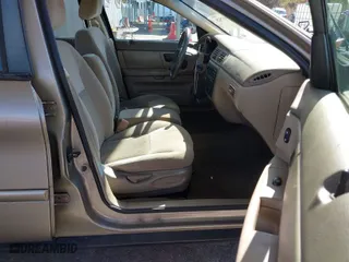 2006 Ford Taurus SE with VIN 1FAHP53266A118054, listed as a IAAI auction lot 41957528 with 131,955 mi miles. Bid and sale history available at carsss.com. Image 5.