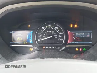 2014 Lincoln MKZ Hybrid z VIN 3LN6L2LU7ER811633, wystawiony jako IAAI lot #41870485 z przebiegiem 203 692 mil mil oraz . Historia ofert i sprzedaży dostępna na DreamBid. Obrazek 7.