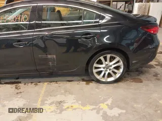 2015 Mazda 6 i Touring with VIN JM1GJ1V6XF1163952, listed as a IAAI auction lot 42230410 with 148,177 mi miles and . Bid and sale history available at carsss.com. Image 6.