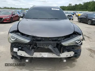 2018 Alfa Romeo Stelvio z VIN ZASFAKANXJ7C19707, wystawiony jako Copart lot #56553175 z przebiegiem 67 757 mil mil oraz Tytuł czysty. Historia ofert i sprzedaży dostępna na DreamBid. Obrazek 5.