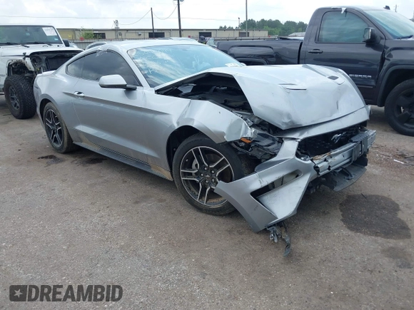 2020 Ford Mustang EcoBoost z VIN 1FA6P8TH2L5186210, wystawiony jako IAAI lot #42103657 z przebiegiem 68 790 mil mil oraz . Historia ofert i sprzedaży dostępna na DreamBid. Obrazek 1.