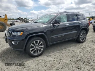 2018 Jeep Grand Cherokee Limited z VIN 1C4RJFBG8JC106374, wystawiony jako Copart lot #58212965 z przebiegiem 61 813 mil mil oraz Szkoda całkowita • Salvage title. Historia ofert i sprzedaży dostępna na DreamBid. Obrazek 1.