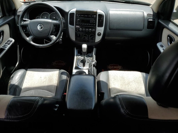 2005 Mercury Mariner Luxury z VIN 4M2CU57185DJ16120, wystawiony jako Copart lot #61803024 z przebiegiem 176 498 mil mil oraz Szkody całkowita. Historia ofert i sprzedaży dostępna na DreamBid. Obrazek 8.
