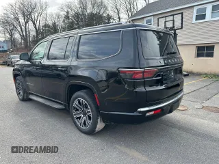 2024 Jeep Wagoneer Series II Carbide with VIN 1C4SJVBP1RS139245, listed as a Copart auction lot 87844025 with 13,921 mi miles and Salvage Title. Bid and sale history available at DreamBid. Image 2.