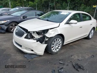 2013 Buick LaCrosse Leather with VIN 1G4GC5E3XDF229810, listed as a IAAI auction lot 42468293 with 54,484 mi miles and . Bid and sale history available at DreamBid. Image 2.