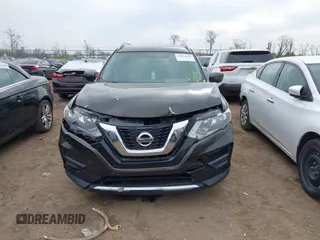 2017 Nissan Rogue S with VIN KNMAT2MTXHP501072, listed as a IAAI auction lot 42001030 with 163,204 mi miles and . Bid and sale history available at DreamBid. Image 12.