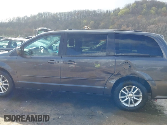 2015 Dodge Grand Caravan SXT with VIN 2C4RDGCG8FR541373, listed as a IAAI auction lot 41990500 with 114,100 mi miles and . Bid and sale history available at DreamBid. Image 14.