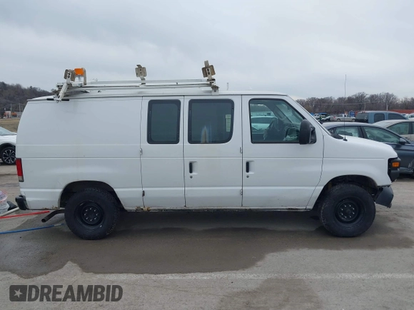 2009 Ford Econoline Cargo Commercial with VIN 1FTNE14W49DA93428, listed as a IAAI auction lot 41641859 with 220,630 mi miles and . Bid and sale history available at DreamBid. Image 13.