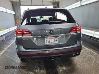 2023 Volkswagen Atlas SE z VIN 1V2HR2CA5PC526012, wystawiony jako IAAI lot #42796408 z przebiegiem 41 216 mil mil oraz . Historia ofert i sprzedaży dostępna na DreamBid. Obrazek 21.