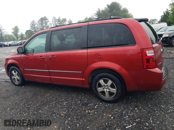 2010 Dodge Grand Caravan SXT z VIN 2D4RN5D10AR179773, wystawiony jako Copart lot #56855235 z przebiegiem 239 925 mil mil oraz Nie do naprawy • Non repairable. Historia ofert i sprzedaży dostępna na DreamBid. Obrazek 2.