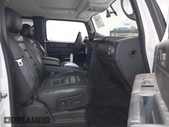 2006 Hummer H2 with VIN 5GRGN23U06H121985, listed as a IAAI auction lot 41336620 with 171,647 mi miles. Bid and sale history available at carsss.com. Image 5.