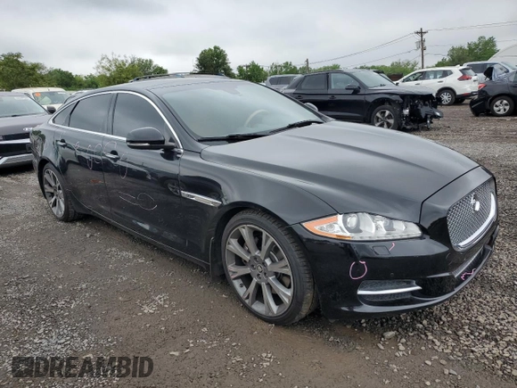 2013 Jaguar XJ Portfolio with VIN SAJWJ2GD0D8V44292, listed as a Copart auction lot 57073775 with 100,458 mi miles and Salvage Title. Bid and sale history available at DreamBid. Image 4.