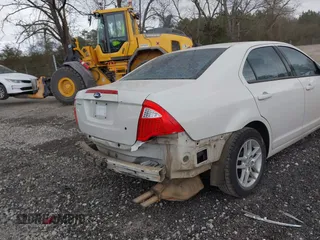 2011 Ford Fusion S with VIN 3FAHP0GA1BR337461, listed as a IAAI auction lot 41715964 with 219,486 mi miles. Bid and sale history available at carsss.com. Image 6.