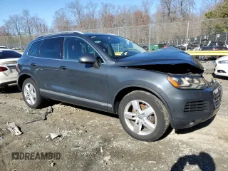 2012 Volkswagen Touareg Lux с VIN WVGEK9BP1CD008132, выставлен на аукционе Copart как лот 49501765 с пробегом 156 594 миль миль и Списание • Salvage title. История ставок и продаж доступна на DreamBid. Изображение 4.