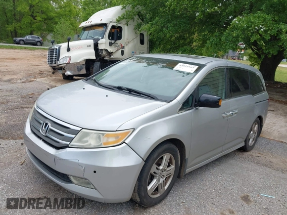 2012 Honda Odyssey Touring with VIN 5FNRL5H95CB101605, listed as a IAAI auction lot 42025163 with 286,421 mi miles. Bid and sale history available at carsss.com. Image 2.