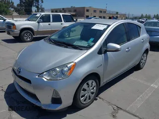 2014 Toyota Prius One with VIN JTDKDTB38E1061202, listed as a IAAI auction lot 42044747 with 133,409 mi miles and . Bid and sale history available at DreamBid. Image 6.