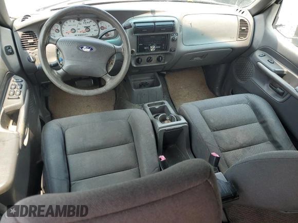 2001 Ford Explorer Sport Trac with VIN 1FMZU67E51UA46266, listed as a Copart auction lot 56628755 with 210,524 mi miles and Salvage title. Bid and sale history available at DreamBid. Image 8.