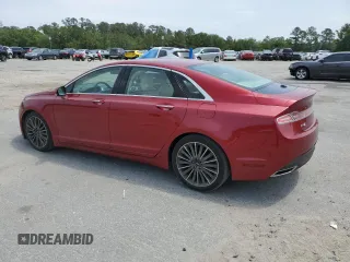 2014 Lincoln MKZ z VIN 3LN6L2GK4ER825465, wystawiony jako Copart lot #55911345 z przebiegiem 78 783 mil mil oraz Szkoda całkowita • Salvage title. Historia ofert i sprzedaży dostępna na DreamBid. Obrazek 2.