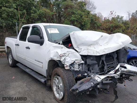 2012 Chevrolet Silverado 1500 LT with VIN 3GCPKSE72CG109571, listed as a IAAI auction lot 40809226 with 124,270 mi miles. Bid and sale history available at carsss.com. Image 1.