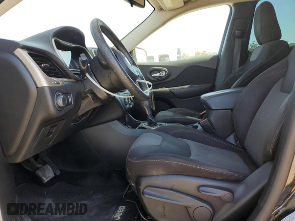 2016 Jeep Cherokee Altitude with VIN 1C4PJLAB2GW126428, listed as a Copart auction lot 56149585 with 214,359 mi miles and Salvage Title. Bid and sale history available at DreamBid. Image 7.