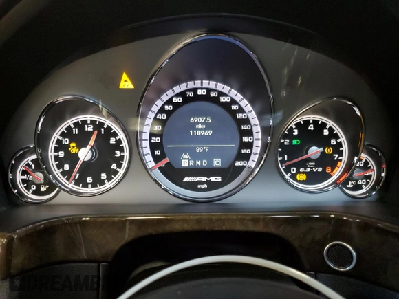 2010 Mercedes-Benz E 63 AMG with VIN WDDHF7HB3AA154977, listed as a Copart auction lot 65630454 with 118,969 mi miles and Salvage title. Bid and sale history available at DreamBid. Image 9.