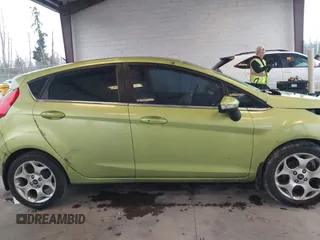 2011 Ford Fiesta SES with VIN 3FADP4FJ7BM127600, listed as a IAAI auction lot 41657170 with 135,483 mi miles. Bid and sale history available at carsss.com. Image 14.