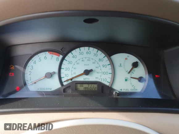2004 Toyota Corolla CE with VIN 1NXBR38E44Z310906, listed as a Copart auction lot 55361565 with 186,022 mi miles and Salvage Title. Bid and sale history available at DreamBid. Image 9.