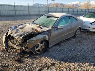2003 Mercedes-Benz CLK-Class 5.0L with VIN WDBTJ75J23F047115, listed as a Copart auction lot 87011274 with 0 mi miles and Salvage Title. Bid and sale history available at carsss.com. Image 1.