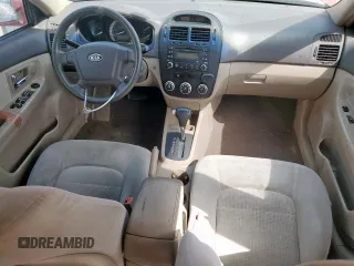2007 Kia Spectra EX with VIN KNAFE122475378574, listed as a Copart auction lot 56921925 with 142,268 mi miles and Salvage title. Bid and sale history available at DreamBid. Image 8.