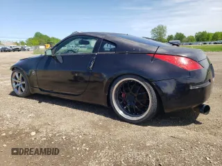 2005 Nissan 350Z Enthusiast z VIN JN1AZ34DX5M607390, wystawiony jako Copart lot #57277905 z przebiegiem 97 629 mil mil oraz Tytuł czysty. Historia ofert i sprzedaży dostępna na DreamBid. Obrazek 2.
