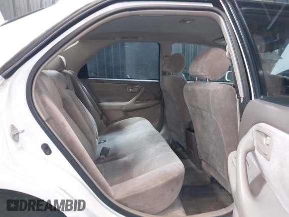 1999 Toyota Camry LE z VIN 4T1BG22K1XU888402, wystawiony jako IAAI lot #42483791 z przebiegiem 149 512 mil mil oraz . Historia ofert i sprzedaży dostępna na DreamBid. Obrazek 8.