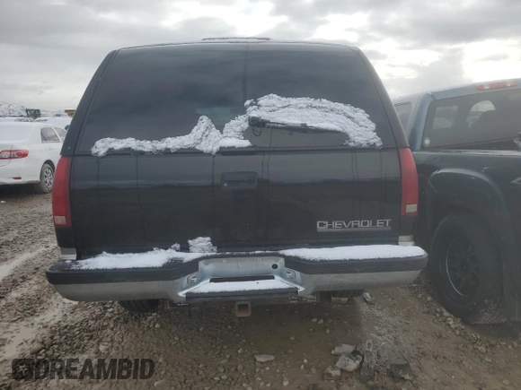 1997 Chevrolet Suburban with VIN 3GNFK16RXVG133472, listed as a Copart auction lot 48998175 with 180,543 mi miles and Salvage Title. Bid and sale history available at carsss.com. Image 6.