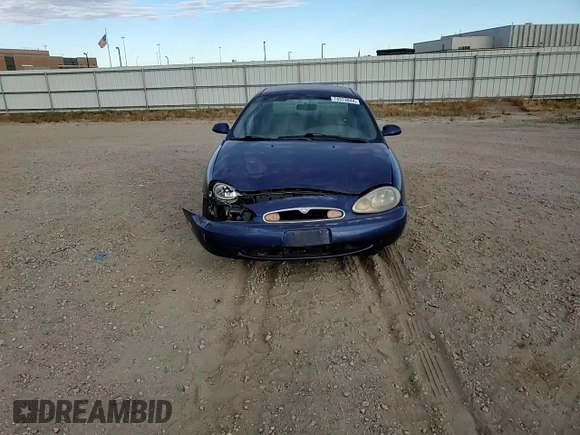 1996 Mercury Sable GS z VIN 1MELM50U3TA659219, wystawiony jako Copart lot #74373944 z przebiegiem 156 398 mil mil oraz Szkody całkowita. Historia ofert i sprzedaży dostępna na DreamBid. Obrazek 11.