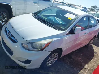 2014 Hyundai Accent GLS with VIN KMHCT4AE4EU590415, listed as a IAAI auction lot 41877817 with 169,285 mi miles. Bid and sale history available at carsss.com. Image 2.