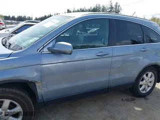 2009 Honda CR-V EX-L with VIN JHLRE48739C009761, listed as a IAAI auction lot 42003486 with 94,971 mi miles. Bid and sale history available at carsss.com. Image 14.