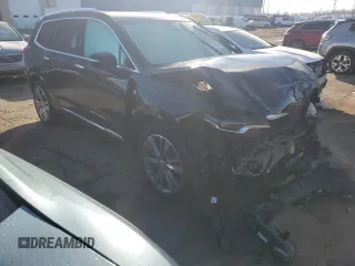 2021 Cadillac XT6 Premium Luxury z VIN 1GYKPCRS5MZ110015, wystawiony jako Copart lot #49323935 z przebiegiem 28 453 mil mil oraz Czysty tytuł • Clean title. Historia ofert i sprzedaży dostępna na DreamBid. Obrazek 4.