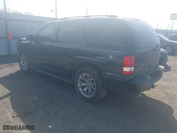 2004 GMC Yukon Denali with VIN 1GKEK63U24J265167, listed as a IAAI auction lot 41877785 with 256,691 mi miles. Bid and sale history available at carsss.com. Image 3.