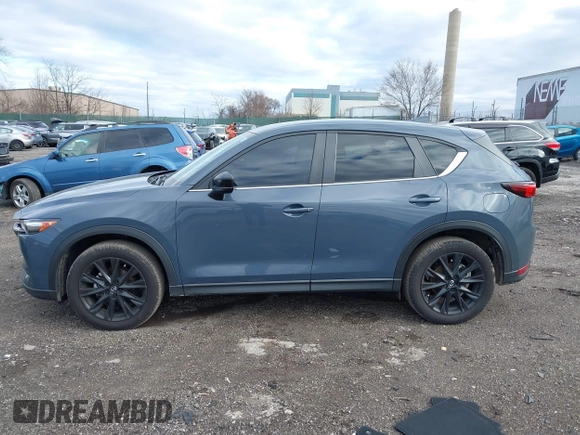 2021 Mazda CX-5 Touring with VIN JM3KFBCM5M0483547, listed as a IAAI auction lot 41683694 with 55,791 mi miles. Bid and sale history available at carsss.com. Image 14.