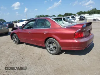 2002 Mitsubishi Galant ES z VIN 4A3AA46G02E153719, wystawiony jako Copart lot #65781504 z przebiegiem 341 516 mil mil oraz Szkoda całkowita • Salvage title. Historia ofert i sprzedaży dostępna na DreamBid. Obrazek 2.
