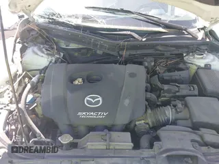 2016 Mazda Mazda6 i Grand Touring with VIN JM1GJ1W55G1443186, listed as a IAAI auction lot 42063716 with 114,263 mi miles. Bid and sale history available at carsss.com. Image 10.