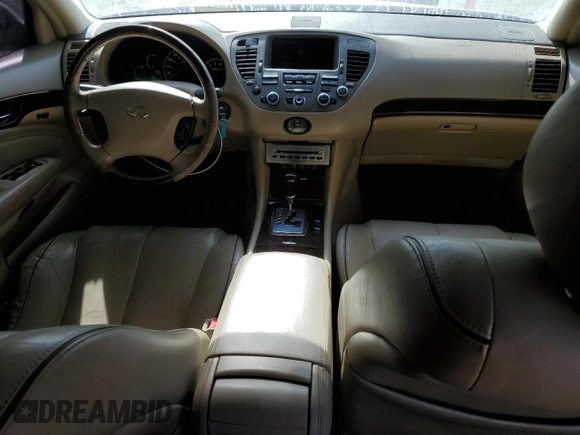 2005 Infiniti Q45 z VIN JNKBF01A85M100070, wystawiony jako Copart lot #82127494 z przebiegiem 176 578 mil mil oraz Szkoda całkowita • Salvage title. Historia ofert i sprzedaży dostępna na DreamBid. Obrazek 8.