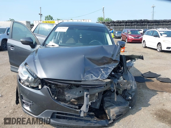 2016 Mazda CX-5 Sport with VIN JM3KE4BY7G0893984, listed as a IAAI auction lot 42479813 with Not provided miles and . Bid and sale history available at DreamBid. Image 13.