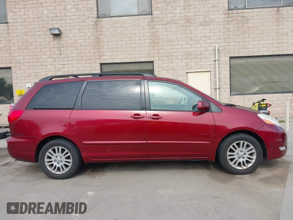 2009 Toyota Sienna XLE with VIN 5TDZK22C29S261516, listed as a IAAI auction lot 41831006 with 147,667 mi miles. Bid and sale history available at carsss.com. Image 13.