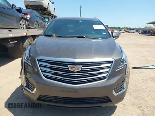 2019 Cadillac XT5 FWD z VIN 1GYKNARS1KZ235083, wystawiony jako IAAI lot #42002995 z przebiegiem 117 430 mil mil oraz . Historia ofert i sprzedaży dostępna na DreamBid. Obrazek 13.