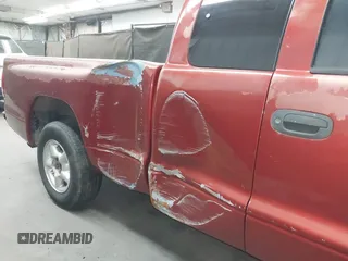 1999 Dodge Dakota SLT z VIN 1B7GL22XXXS240005, wystawiony jako IAAI lot #42269211 z przebiegiem 218 163 mil mil oraz . Historia ofert i sprzedaży dostępna na DreamBid. Obrazek 6.