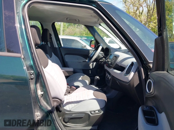 2014 FIAT 500L Easy with VIN ZFBCFABH4EZ022268, listed as a IAAI auction lot 42060203 with 106,918 mi miles. Bid and sale history available at carsss.com. Image 5.